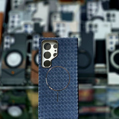 Blue textured phone case with camera design on a blurred background of vintage cameras