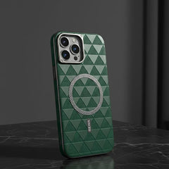 Green geometric patterned phone case on a dark surface with a dark background