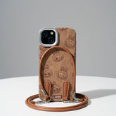 Brown phone case with a strap on a white surface