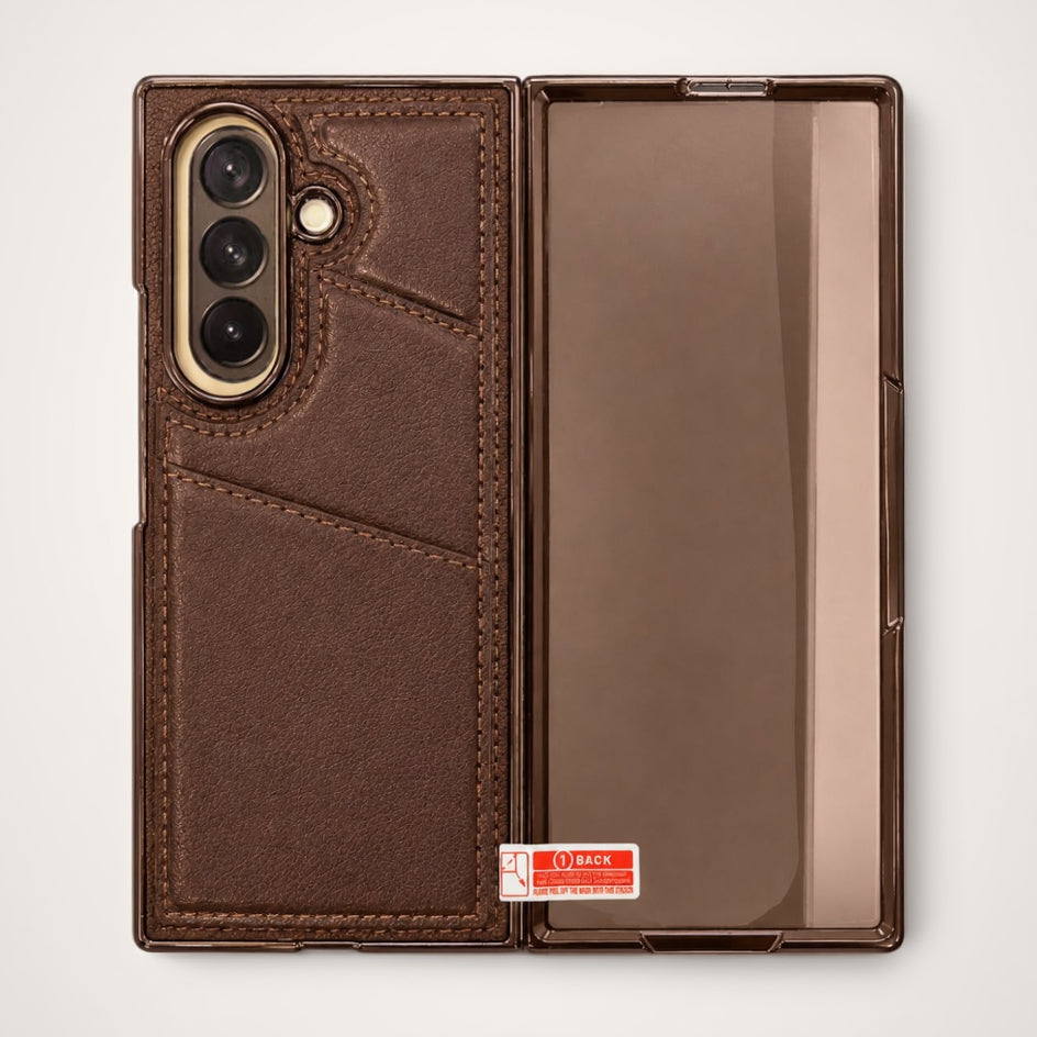 A brown leather wallet phone case shown open, revealing a back with card slots and a camera cutout, alongside a clear back cover panel with a small red and white sticker.