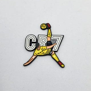 Colorful sports-themed badge with 'CR7' on a light gray background