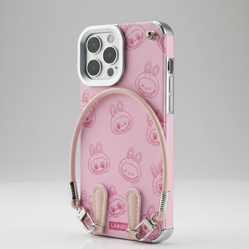 Pink phone case with bunny pattern and stand feature on a gray background