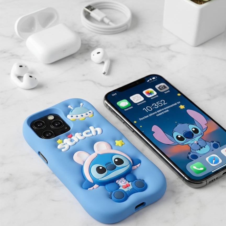 Phone case with cartoon character on a marble surface with phone and earbuds.