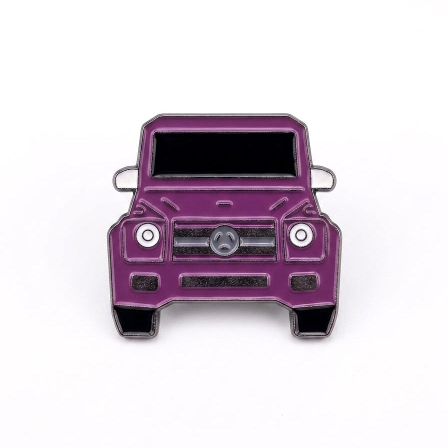 A purple Mercedes-Benz G-Class vehicle enamel pin with silver metal outlines and black details, shown against a plain white background.